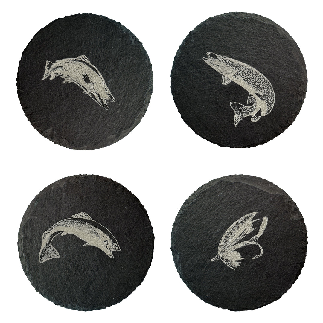 A set of four round coasters with a fish illustration, placed on a dark surface.